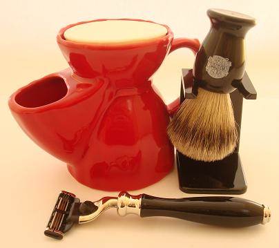 Red Pottery shaving mug, Mannin E black mach 3 razor, shaving brush and dripstand